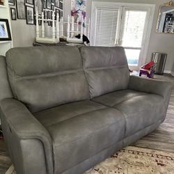 2 Gray Ashley Furniture Reclining Charging Couches