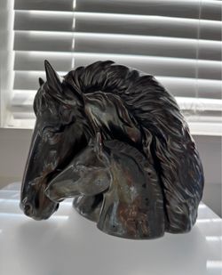 Decorative ceramic horse and foal vase/planter.