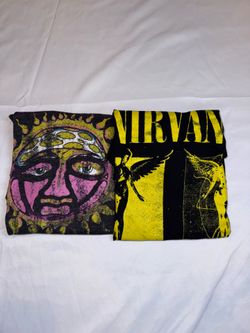 2 women’s size small band tees