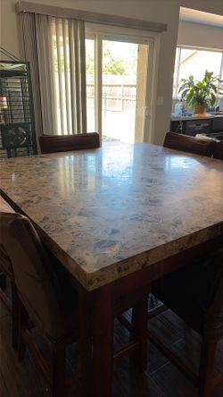 Free stone dining table and chairs if you come get it today.