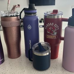 6 travel mugs/bottles - different sizes