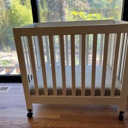 Mini Crib - Folds To Store - With Wheels