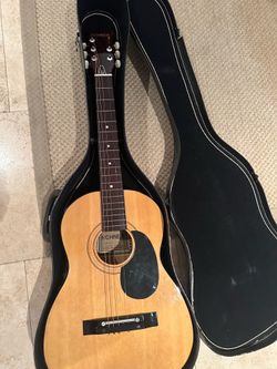Hohner acoustic guitar with hard case