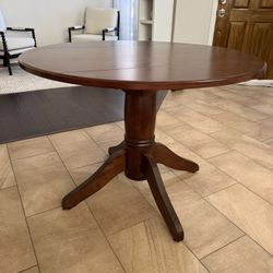 Round Pedestal Table w/ Folding Sides
