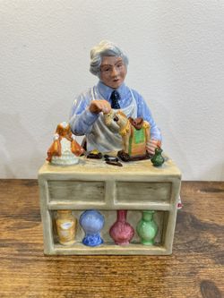 Royal Doulton Collectible Figurine “The China Repairer”