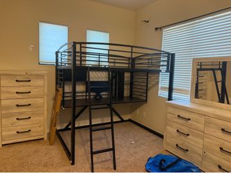 Two bunk bed (full size) with desk setup below, two dressers with mirrors, one tall dresser