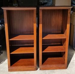 2 Entertainment Towers Cherry wood in color