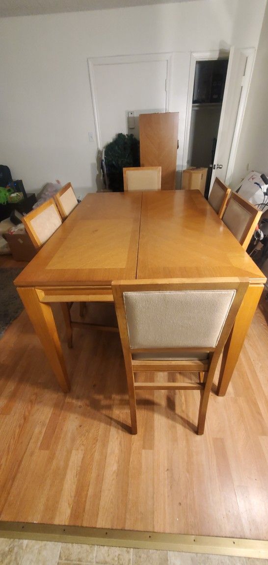 Wooden Dining Table With Table Extension and 8 Chairs, all in great condition!! $100 obo