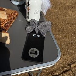 This is a bottle opener and she’s very pretty