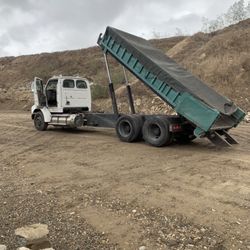 Bobcat & Lowboy Dumpster