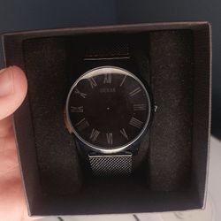 Guess Richmond W1263G3 men's watch with a black dial and a black mesh bracelet