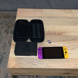 Nintendo switch 1 with dock, case, and Horizon adventures game card