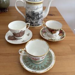 Tea Pot With Teacups and Saucers