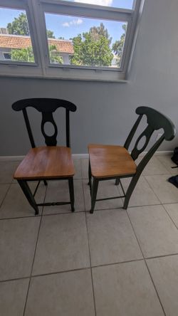 Two wooden chairs
