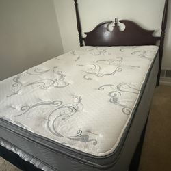 Queen Bed With Matress And A Headboard