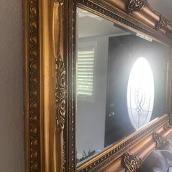 Very beautiful vintage large mirror, ornate with a frame 5 feet wide and 3 feet high, the glass is broken in the corner, make me an offer. 