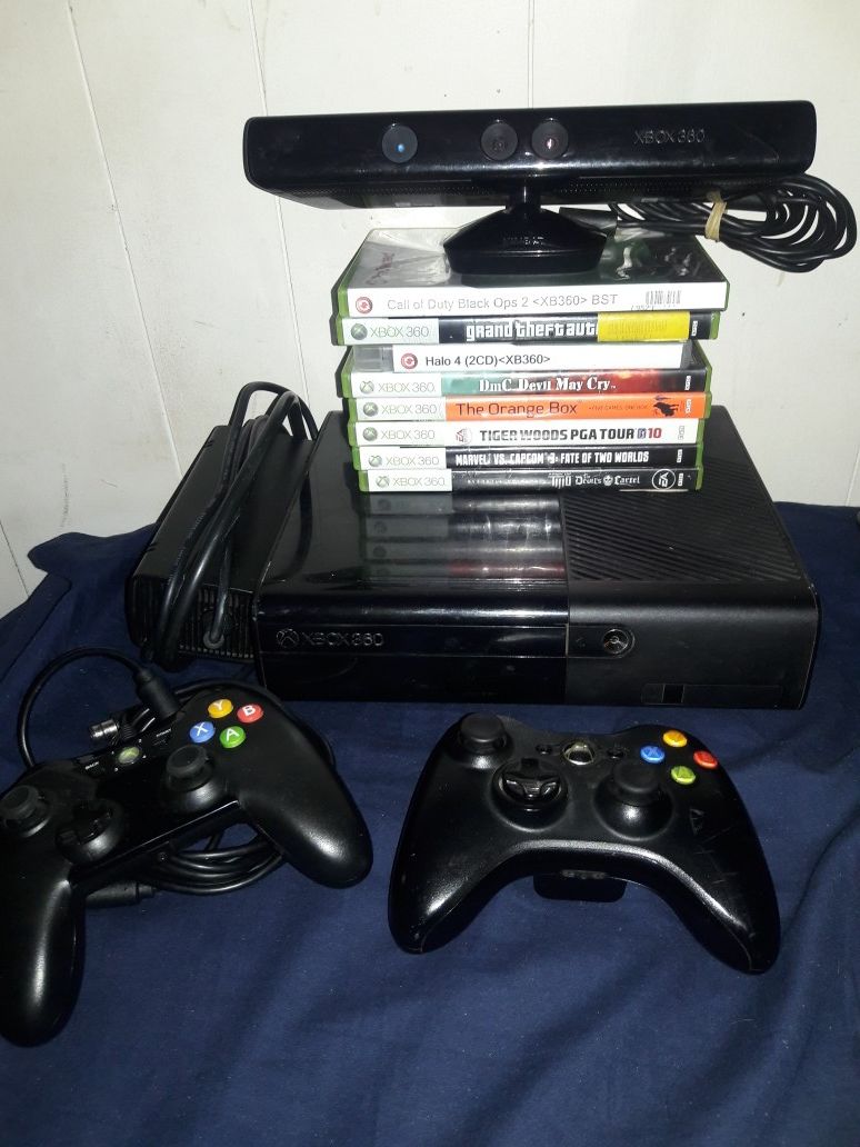 XBOX 360 CONSOLE, 2 CONTROLLERS, 8 GAMES, and a KINECT.