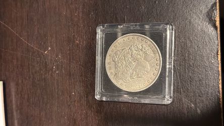 1878 Morgan Silver Dollar in Coin