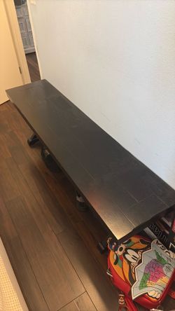 Black wooden bench