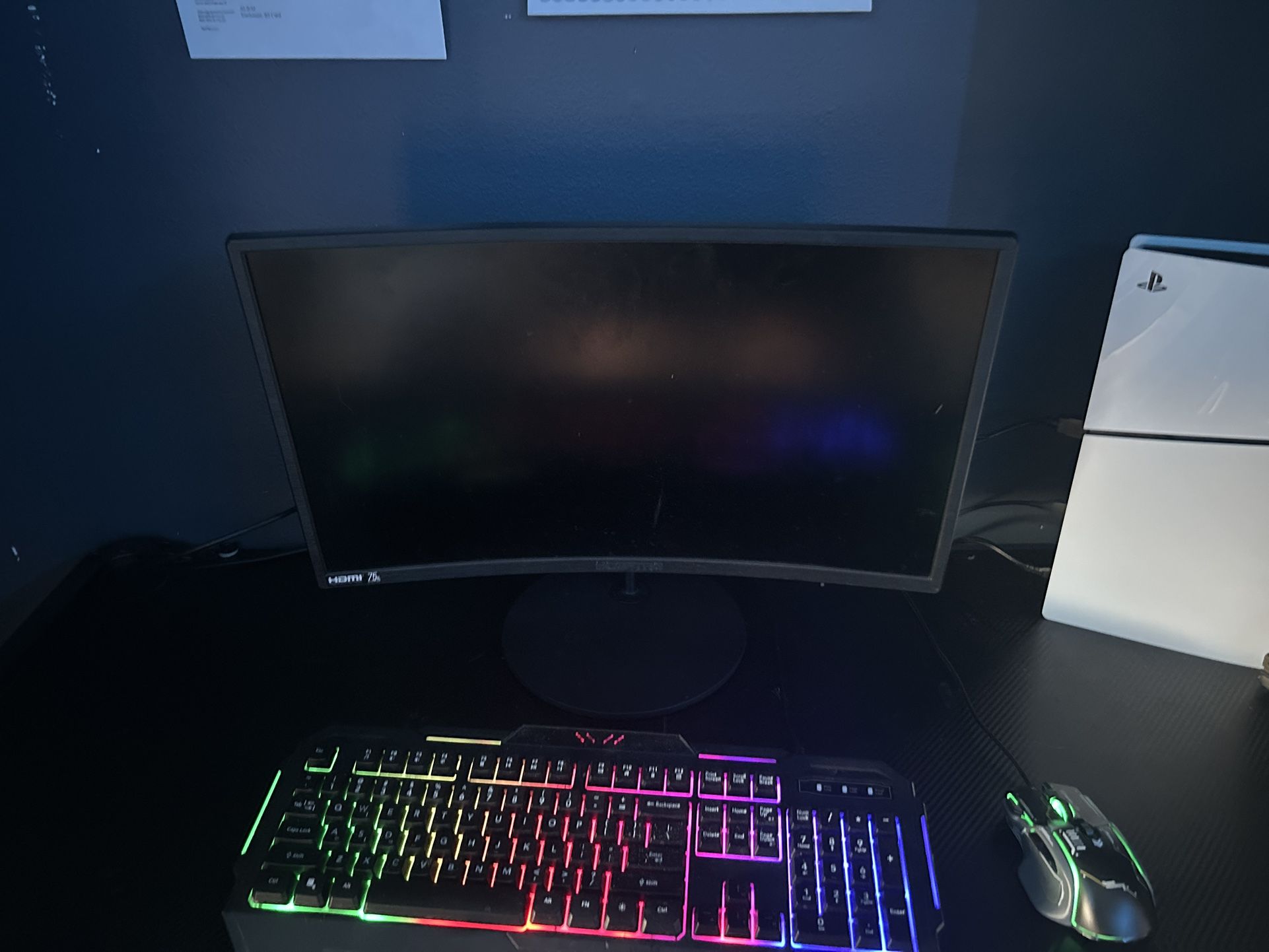 Wired RGB gaming keyboard and mouse with a 75Hz curved 24” gaming monitor