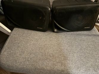Pair of indoor out door Optimus box speakers no hardware sound decent asking 30 for pair don’t need