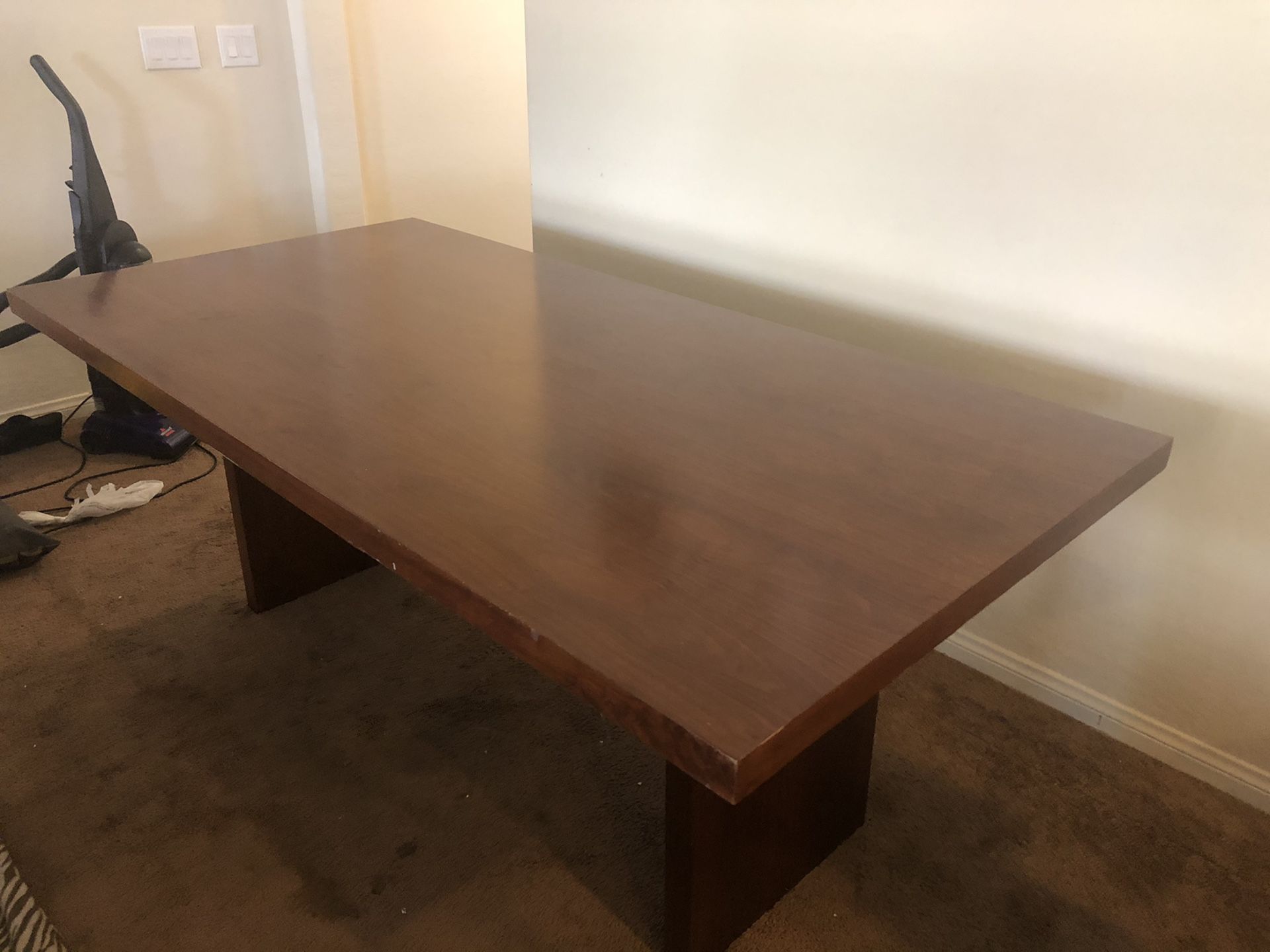 Large rectangular walnut dining table and chairs