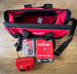 Milwaukee impact, battery, charger and bag
