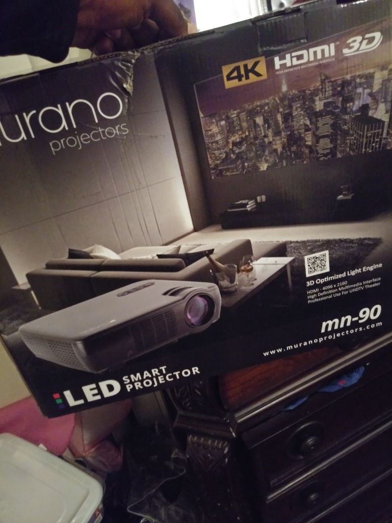 Murano projector mn-90 brand new never used still in box with brand new projector 72in screen will not entertain low ballers u no what this stuff cost