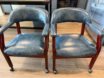 Set of 4 blue vinyl captain’s chairs
