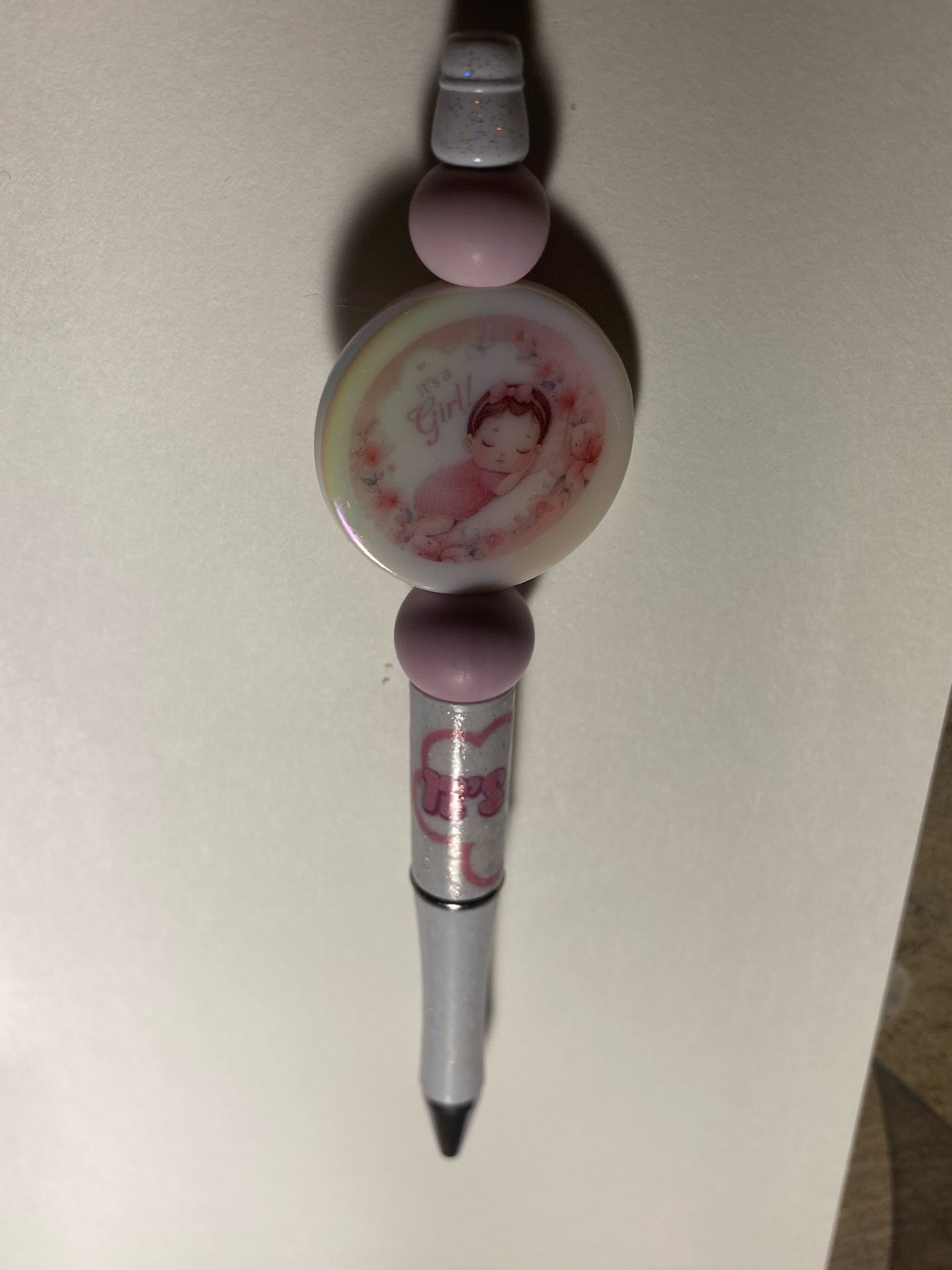 It’s a girl beaded pen