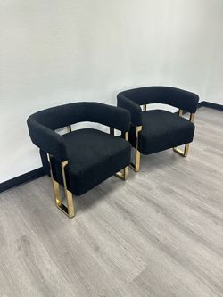 Pair of Black Boucle Barrel Accent Chairs