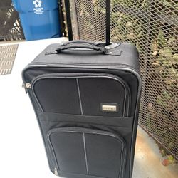 Carry On 7x11x 21 Black Suitcase On Rollers. Reduced 
