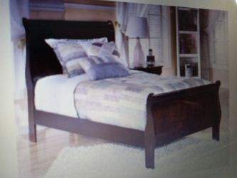 2  Twin Sled beds by Ashley (head and footboard)