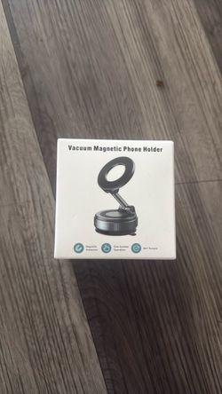 Vacuum magnetic phone holder