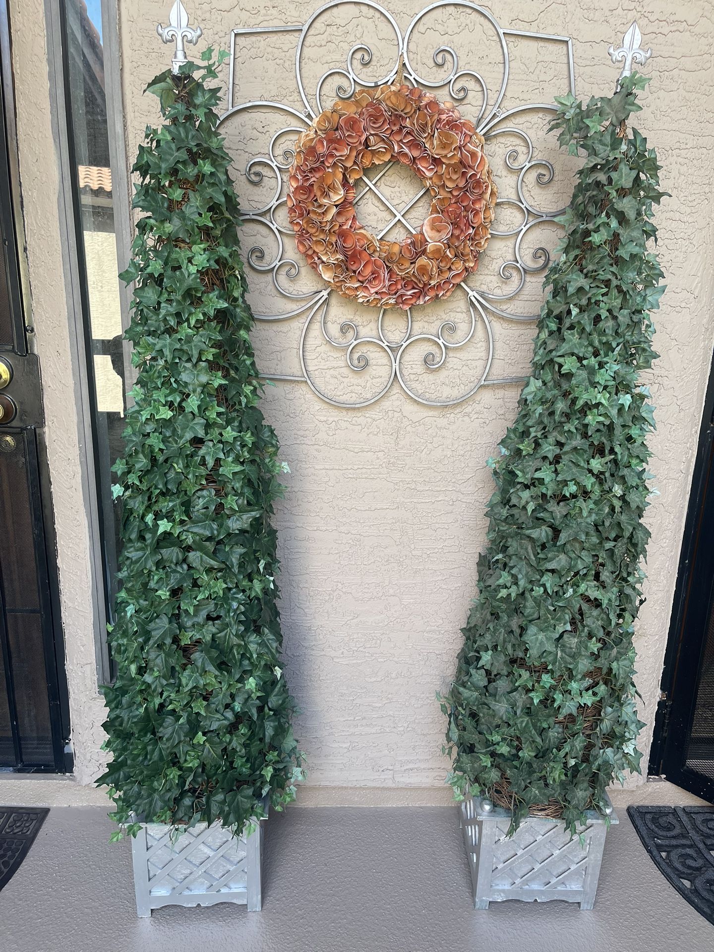 Two (2) matching topiary artificial Ivy plant with silver painted wood box planter.