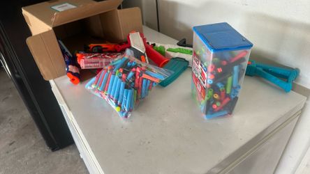 Eight Nerf Guns And Bullets Included