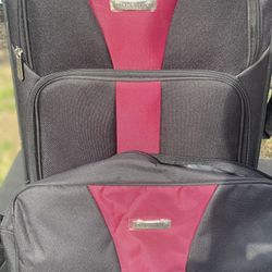 Travel Select" soft-shell luggage pieces, possibly "Borderline" brand, stacked together. 2 piece
