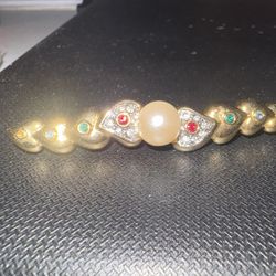 Pearl and stones pendant