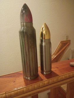 Bullet shaped Water bottles 1-14-inch ,1- 11 inch.   Both for Only $ 10