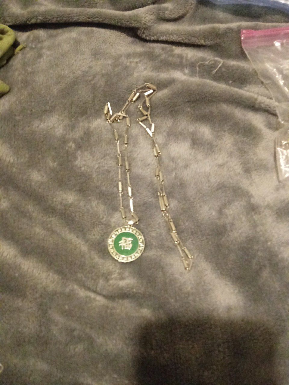 Long necklace with medallion