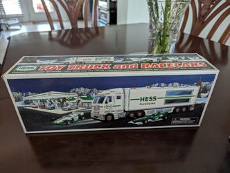 2003 HESS Toy Truck And Race Cars NIB With His Plastic Bag To Match.