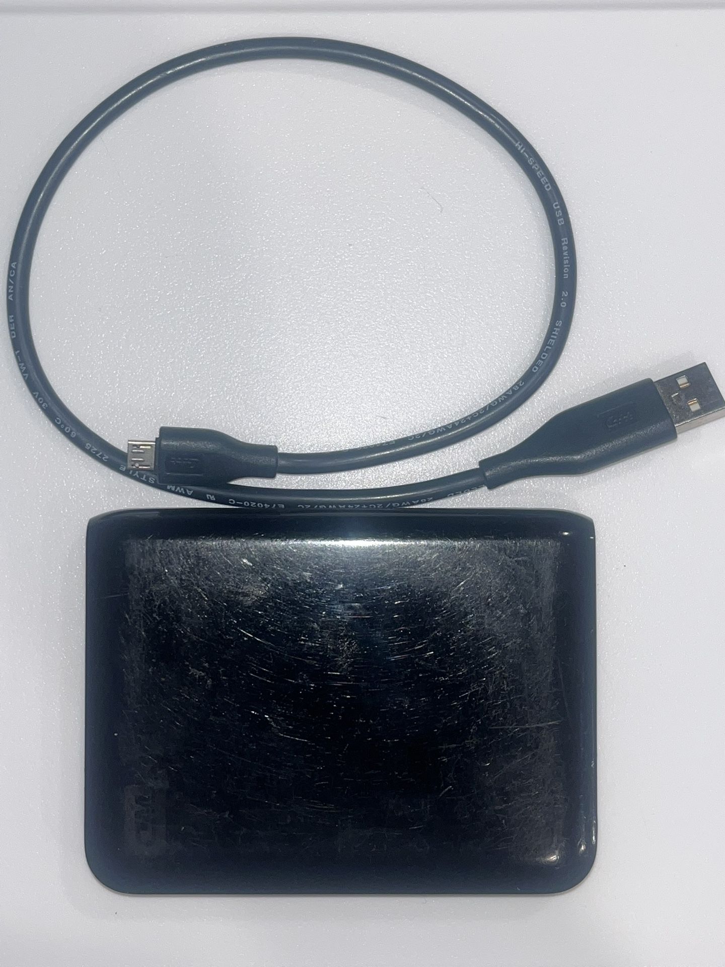 500GB Western Digital My Passport External Hard Drive w/ Cable - $20
