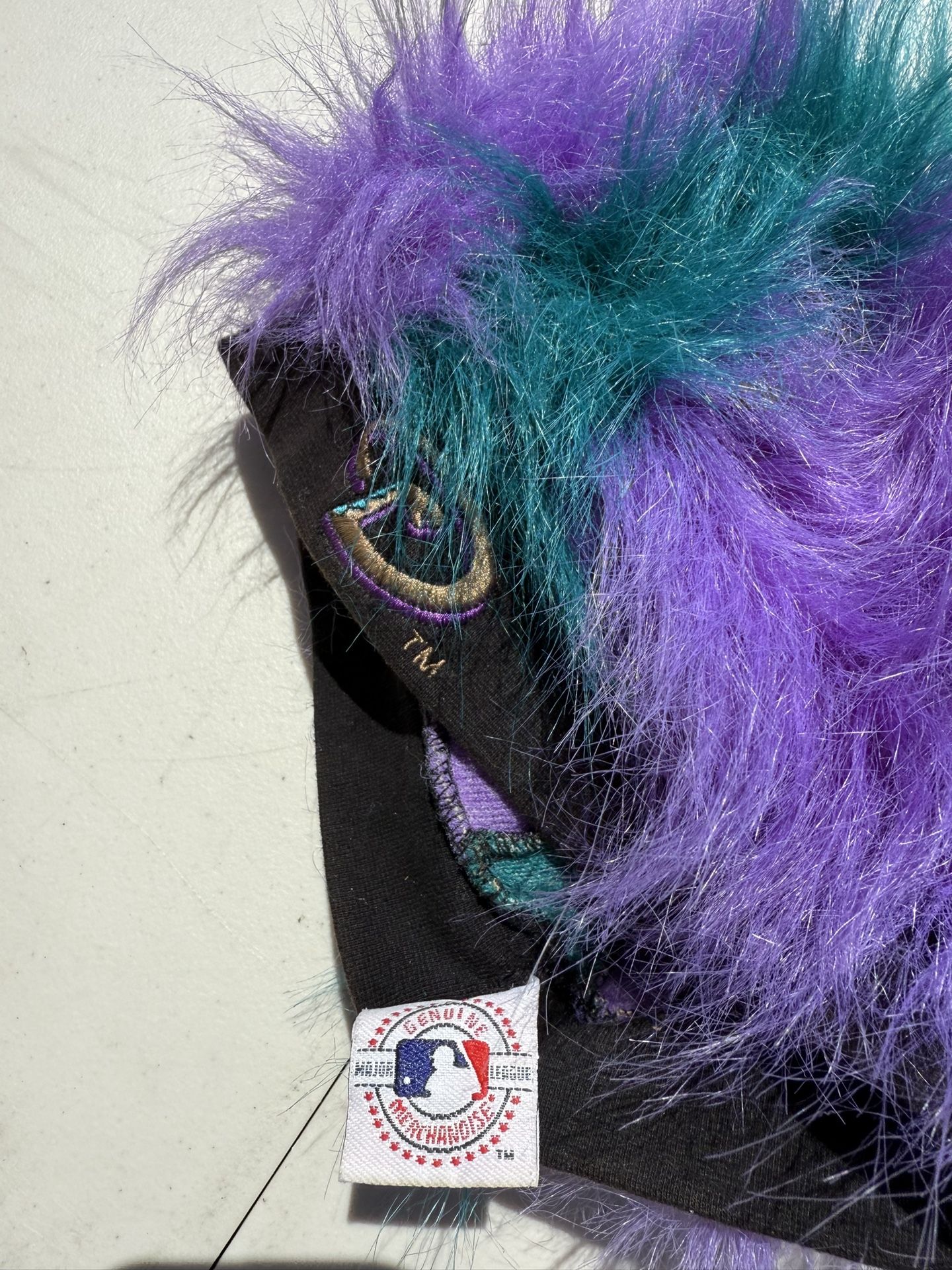AZ Diamondbacks fluffy hat and stuffed animals