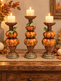 Beautiful set of three pumpkin candleholders