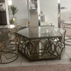 Four beautiful glass, gold tables and two large mirrors for $150