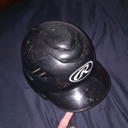 Black Rawlings baseball helmet