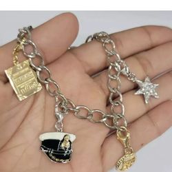 HSN- TITANIC STERLING SILVER 14KT. GOLD CLAD CHARMS BRACELET- 7 IN.