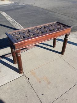 Carved wooden table