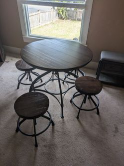 Wood Round spinning table and chairs.