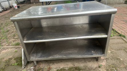 Stainless steel work table in  good condition $225.00